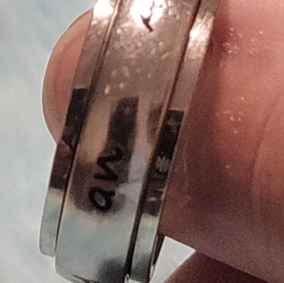 Ring, silver tone, reads "protected by an angel" in black, size 9 - Picture 7 of 7